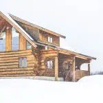 maison en bois en hiver